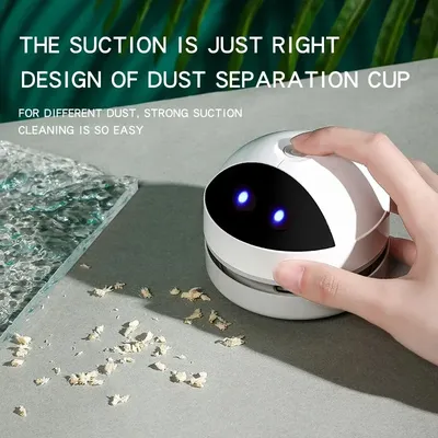 Mini-Tischstaubsauger, tragbarer Schreibtisch-Staubsauger mit abnehmbarer Düse, USB-Aufladung, intelligenter Roboter-Staubsauger für den Innenbereich Image