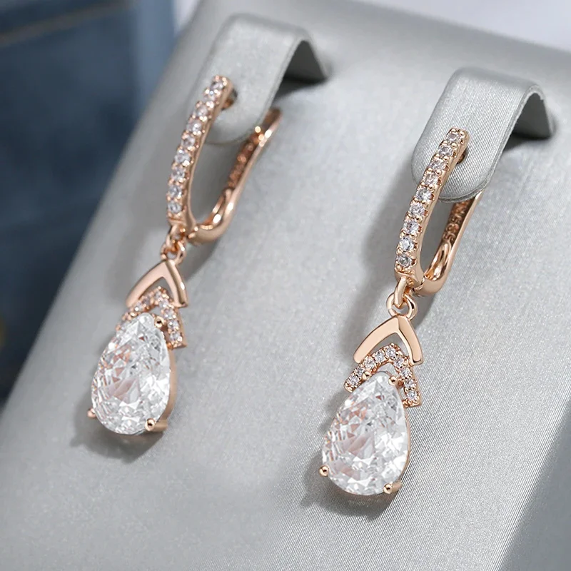 Wbmqda Glänzender weißer Stein, lange Tropfen-Ohrringe für Frauen, 585er Roségold, Farbe, Luxus-Braut, Hochzeit, Schmuckzubehör Image
