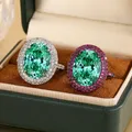 Anello con pietra preziosa verde smeraldo taglio ovale regolabile scintillante CZ Halo argento placcato nero elegante gioielli da festa per le donne