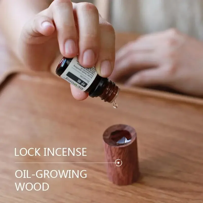Ätherisches Öl, duftendes Holz, kreativer Innen-Räucherstäbchen, Auto-Duft, ätherisches Öl, Dekoration Image