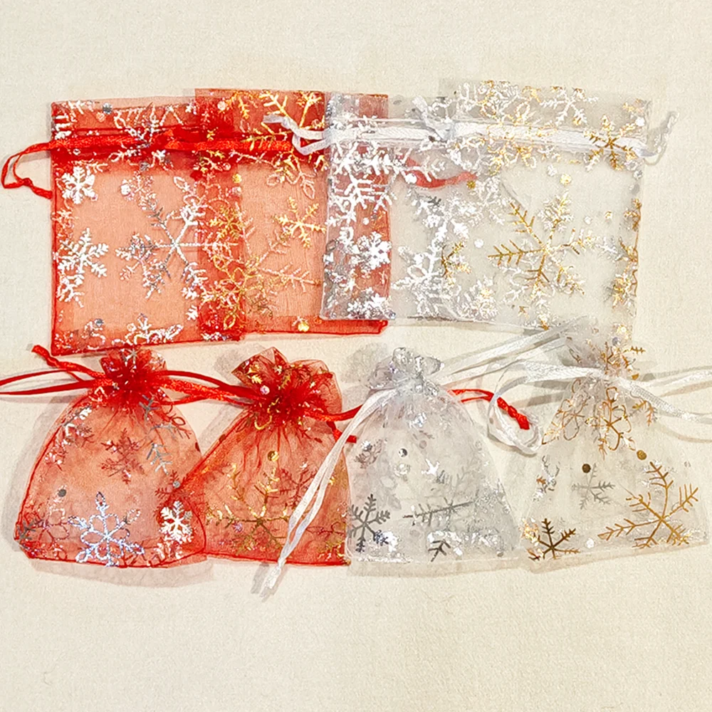 25/50/100 stücke Heißer Druck Organza Geschenk Beutel Für Schmuck Schneeflocke Kordelzug Beutel Für Hochzeit Weihnachten Party süßigkeiten Verpackung Image