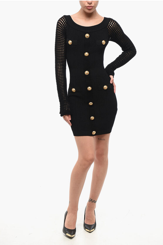 Geripptes Minikleid mit perforierten Ärmeln und dekorativem But in Schwarz Image