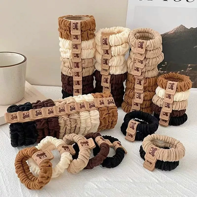 Hochelastischer, gefalteter Haarring, Bärenmarke ohne Beschädigung, Haarseil, hohes Pferdeschwanz-Haarseil, einfacher Stil, Haarseil, Krawatte, Haarseil Image