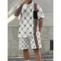 2025 Abbigliamento da uomo estivo Stampa di lettere Top a maniche corte Pantaloncini in vita elastica da uomo Set da 2 pezzi T-shirt taglie forti Set di pantaloncini
