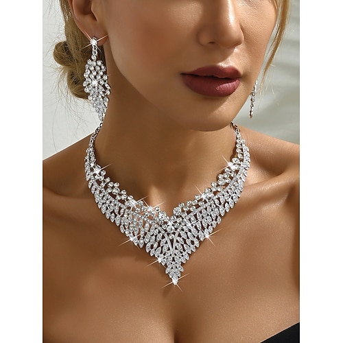 Goldfarbenes Damen-Set aus Halskette und Ohrringen mit roten Kristallakzenten – glamouröser Partyschmuck Image