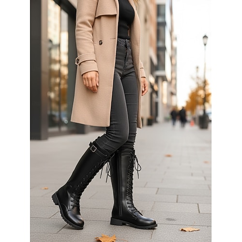 Schwarze Damen-Kampfstiefel mit Schnallendetail und Reißverschluss, robustes, urbanes Modeschuhwerk für moderne Outfits Image