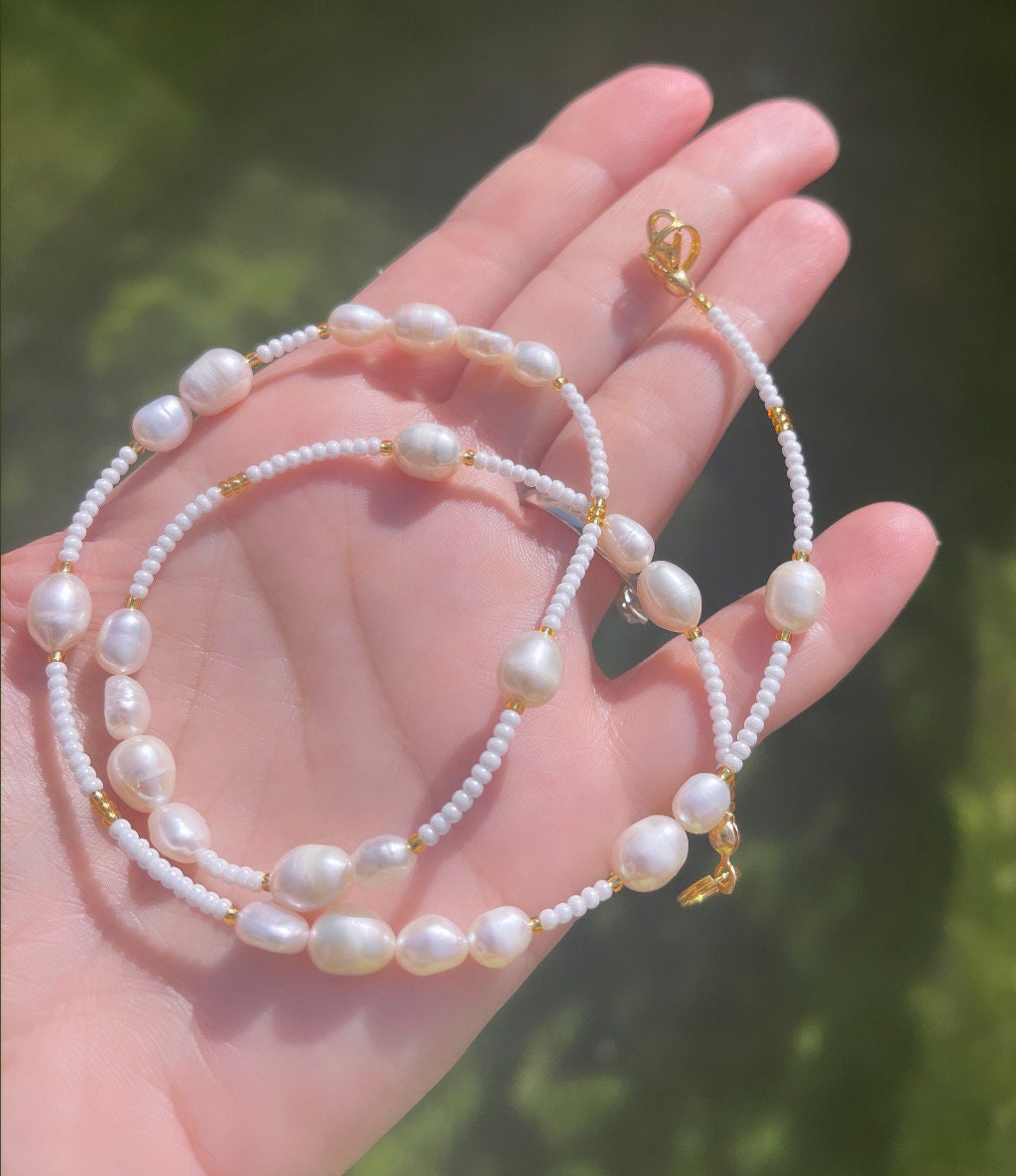 Collana di perle; collana di perle; collana di perle; collana di perle; collana di perle bianche; collana di perle bianche; collana di perle d'acqua d