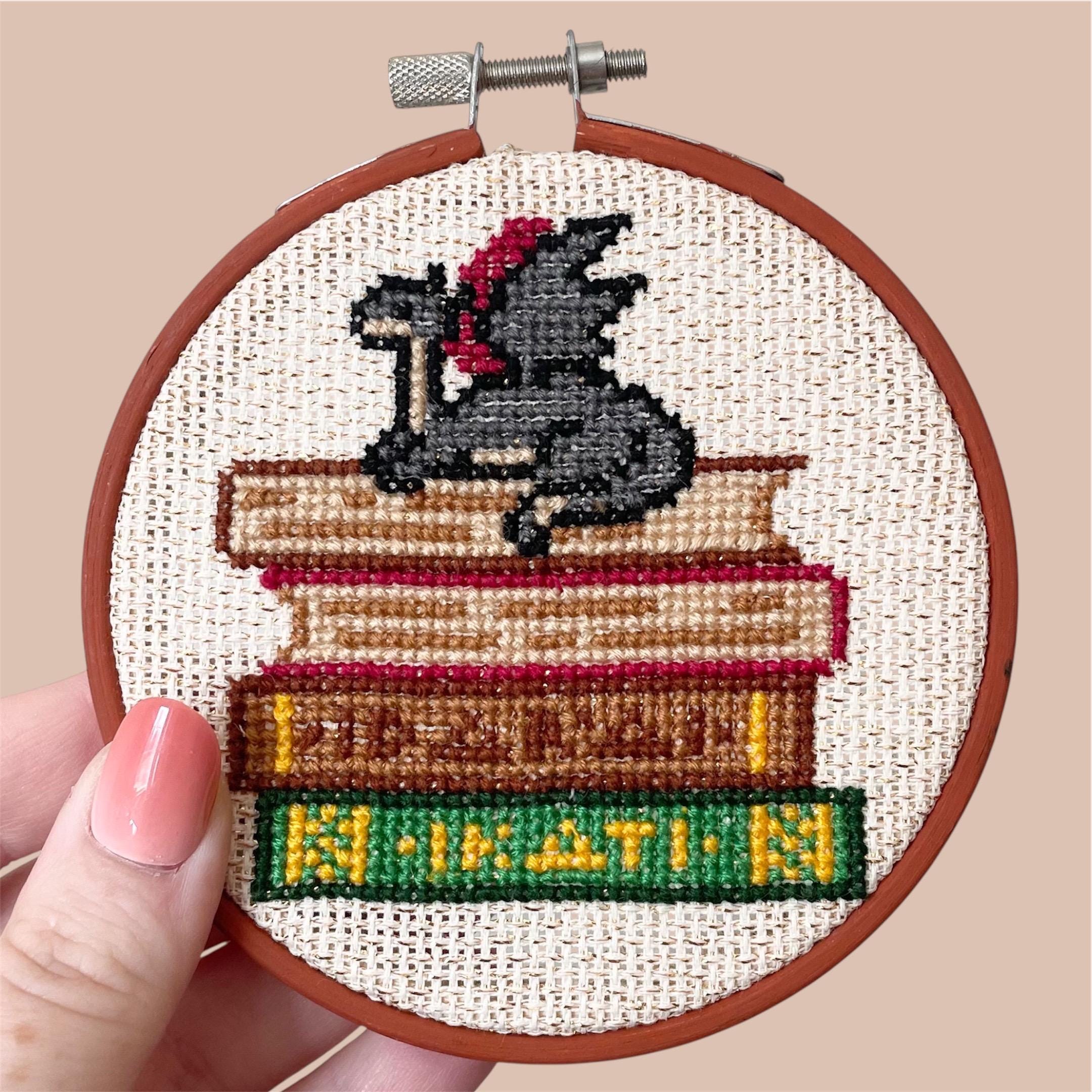 Schema punto croce drago libro - Punto croce drago - Punto croce libresco - Punto croce drago libresco - Schema punto croce fantasy