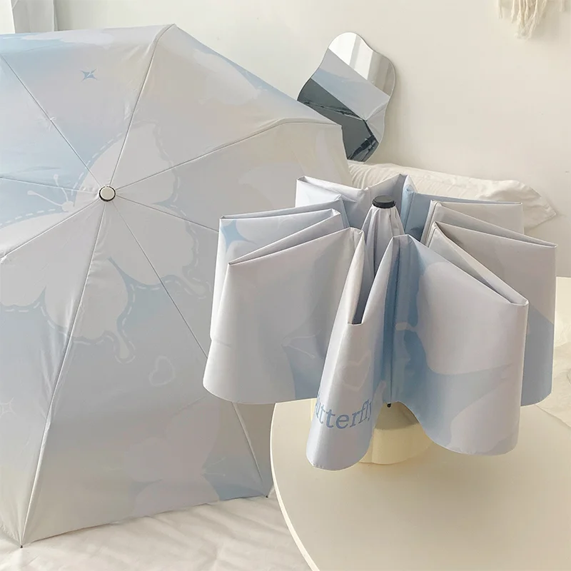 Blue Shadow Butterfly Sonnenschirm, kompakt, dreifach, 8 Rippen, zusammenklappbar, manuell/automatischer Regenschirm, regen-/sonnenschutz, UPF 50+ Image