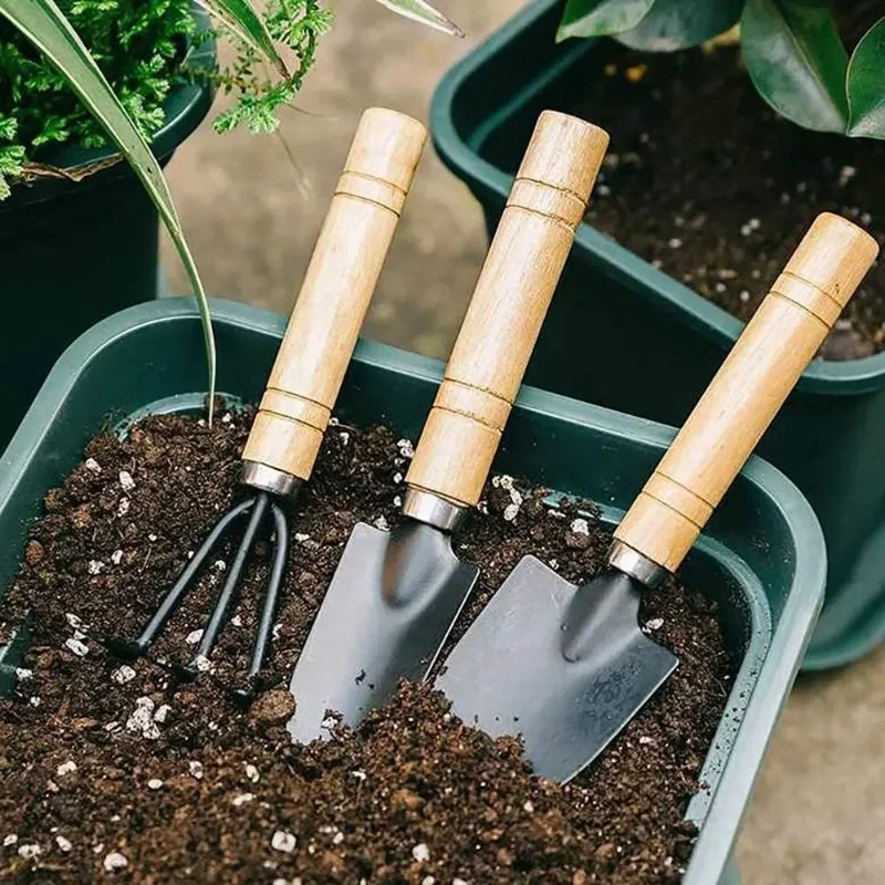Dreiteiliges Set mit Blumenwachstumswerkzeugen für die Gartenarbeit im Haus, zum Locken des Bodens, Blumenspatel, Topfpflanzen und zum Pflanzen von Blumenkunst Image