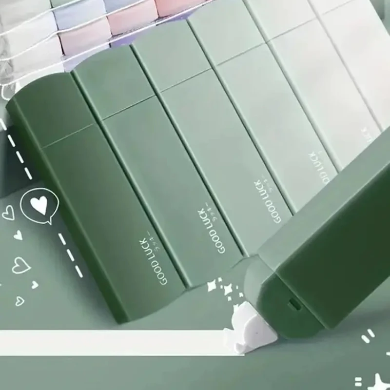 Das Korrekturband graduell ändert sich auf ein hohes Aussehen. Das Schüler-Korrekturband ist glatt und langlebig Image