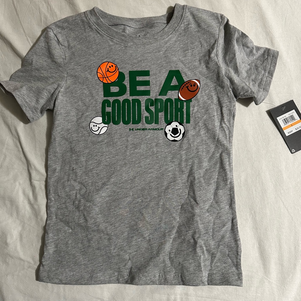 Under Armour Shirts & Tops | Under Armour Gray Kids' 'Be A Good Sport' T-Shirt | Color: Gray/Green | Size: 7