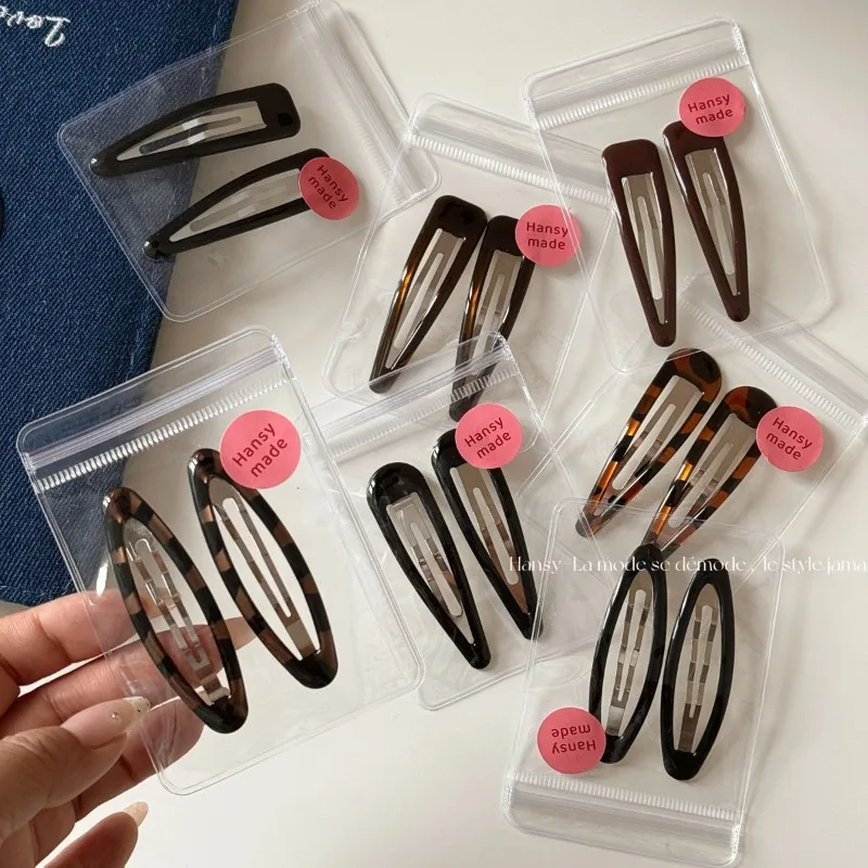 2 Packungen Mode Temperament Leopardenmuster tropfendes Öl Wassertropfen BB Clip Pony Clip neues süßes Mädchen ovaler Haarnadelrandclip Image