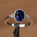 Anelli di fidanzamento con punta di lusso placcati in argento di vendita caldo per le donne Anello di fidanzamento per matrimonio con gioielli in zaffiro smeraldo rubino all'ingrosso