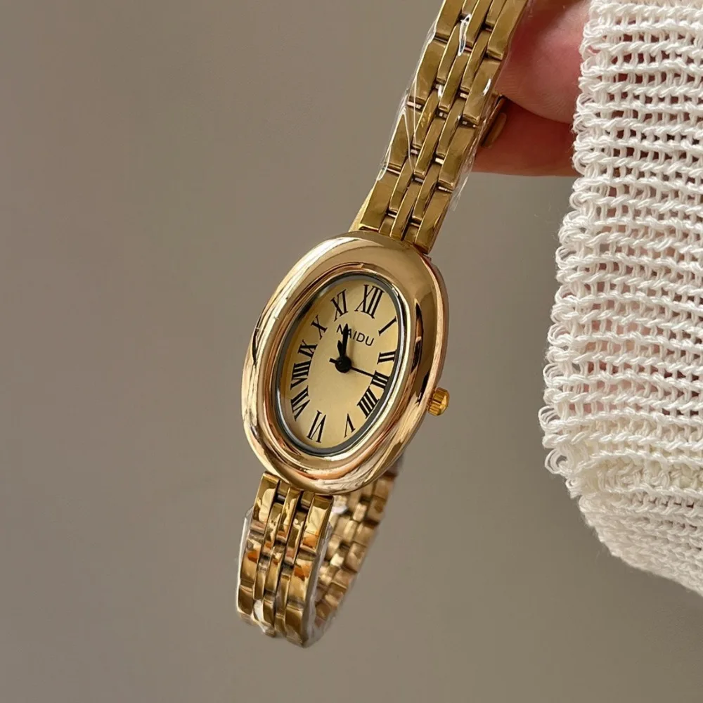 Heißer Verkauf Mode Uhr für Frauen Mid Antike Stil Oval Zifferblatt Kleine Gold Uhr Einstellbare Stahlband Quarz Armbanduhr Großhandel
