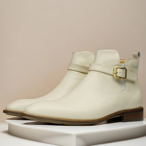 Weiße Herrenstiefeletten mit Schnalle, moderne modische Stiefel mit seitlichem Reißverschluss und Riemenakzent für Hochzeiten, Partys und trendige Freizeitkleidung Image