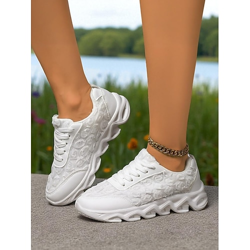 Weiße Damen-Sneaker mit buntem Blumenmuster – leichte, lässige Modeschuhe zum Spazierengehen, Reisen und für die Straße Image