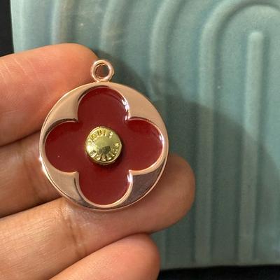 Louis Vuitton Other | Louis Vuitton Red Fleur And Rose Gold Zipper Pulls Charm Charm | Color: Gold/Red | Size: Os