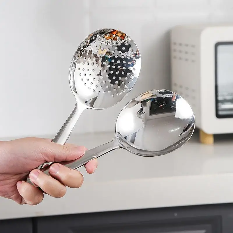 1/2Pcs Edelstahl Löffel Wärme Isolierte Griff Schöpfkellen Ablauf Loch Für Servieren Suppe Reis Servierlöffel Küche utensilien Image