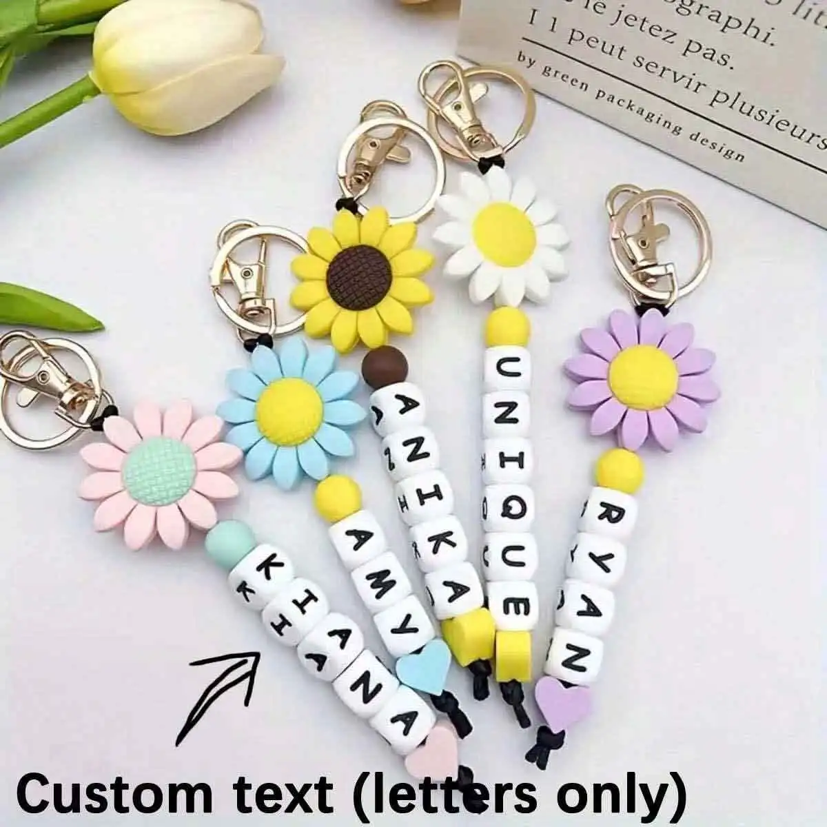 1 STÜCK Benutzerdefinierter süßer Sonnenblumen-Silikon-Schlüsselanhänger, personalisierter englischer Buchstabe, Namen, Taschenzubehör, Weihnachts-/Valentinstagsgeschenk Image