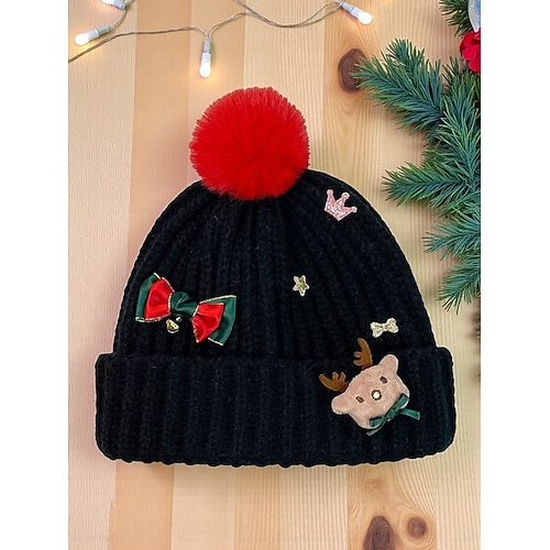 Weihnachtsstrickmütze für Damen mit Bommel, verziert mit Rentier, Schleife und glitzernden Verzierungen, erhältlich in Rot und mehreren Farben für die Feiertage Image