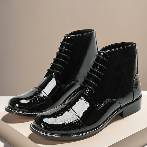 Schwarze, polierte Herren-Ankle-Boots aus echtem Leder – elegantes und glänzendes Design mit spitzer Zehenpartie, ideal für halbformelle Anlässe, Hochzeiten und Abendgarderobe Image