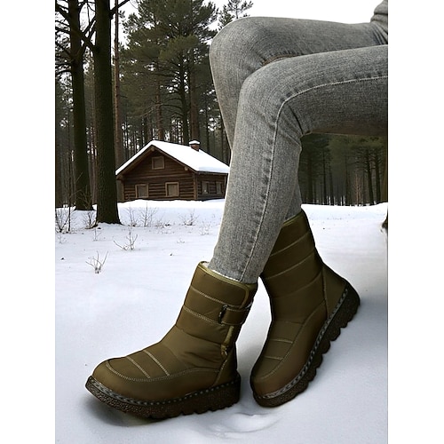 Blaue, gesteppte, wasserdichte Winterstiefel für Damen mit weichem Fleecefutter – isolierte und stylische Outdoor-Stiefel für Schnee, Wandern und Winteraktivitäten Image