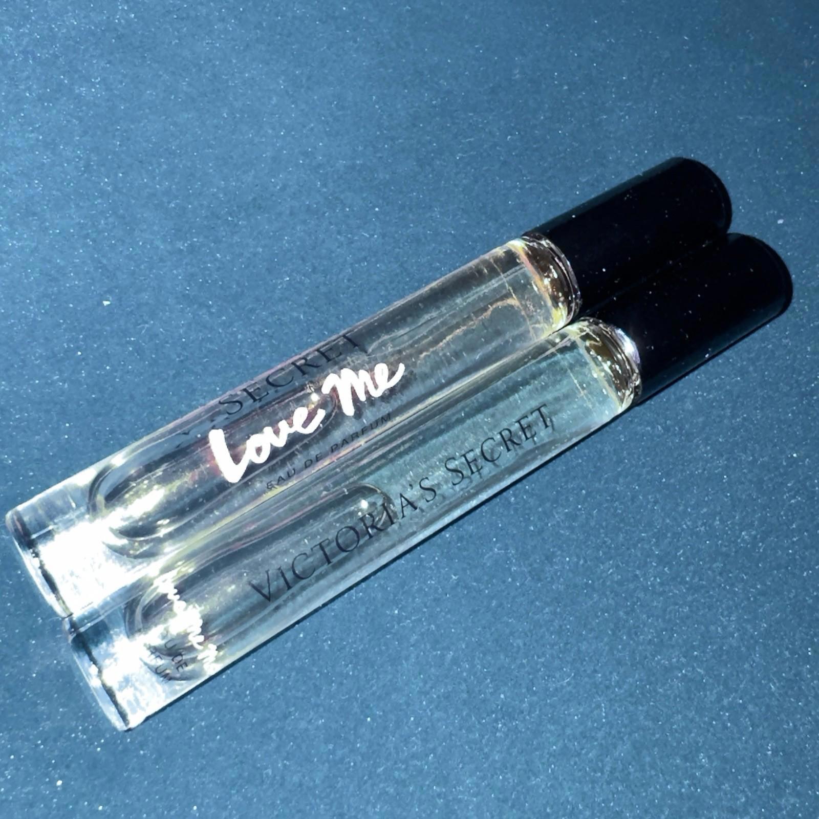 Victoria's Secret Accessories | 2 X Victoria's Secret Love Me & L. M. More Eau De Parfum Rollerball Edp Parfum | Color: Cream | Size: One Size