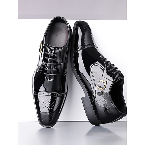 Burgunderrote Monk-Strap-Schuhe für Herren aus Kunstleder – luxuriöses Design mit Flügelkappendetails, perfekt für Hochzeiten und festliche Anlässe. Image