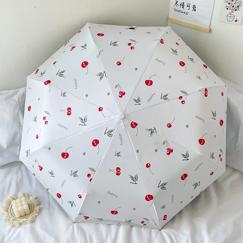 Cherry Story: Kompakter und tragbarer Faltschirm mit doppeltem Verwendungszweck für Regen und Regen, Sonnenschutz mit schwarzem Kleber und UV-Schutz Image