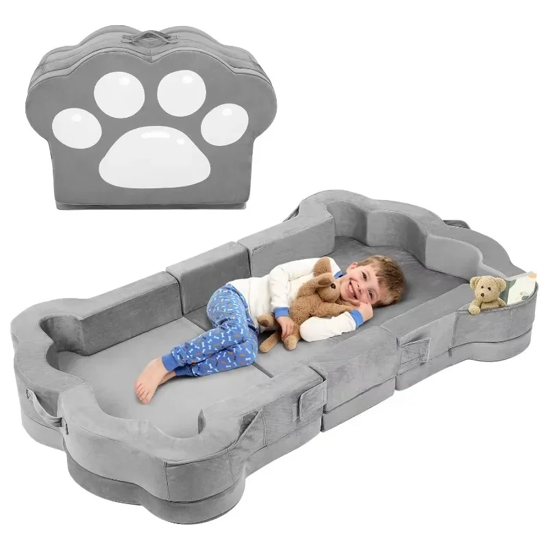 Tragbares, faltbares Bodenbett für Kleinkinder mit waschbarem Stoffbezug für Kinderreisebetten im Schlafzimmer oder Wohnzimmer. Image