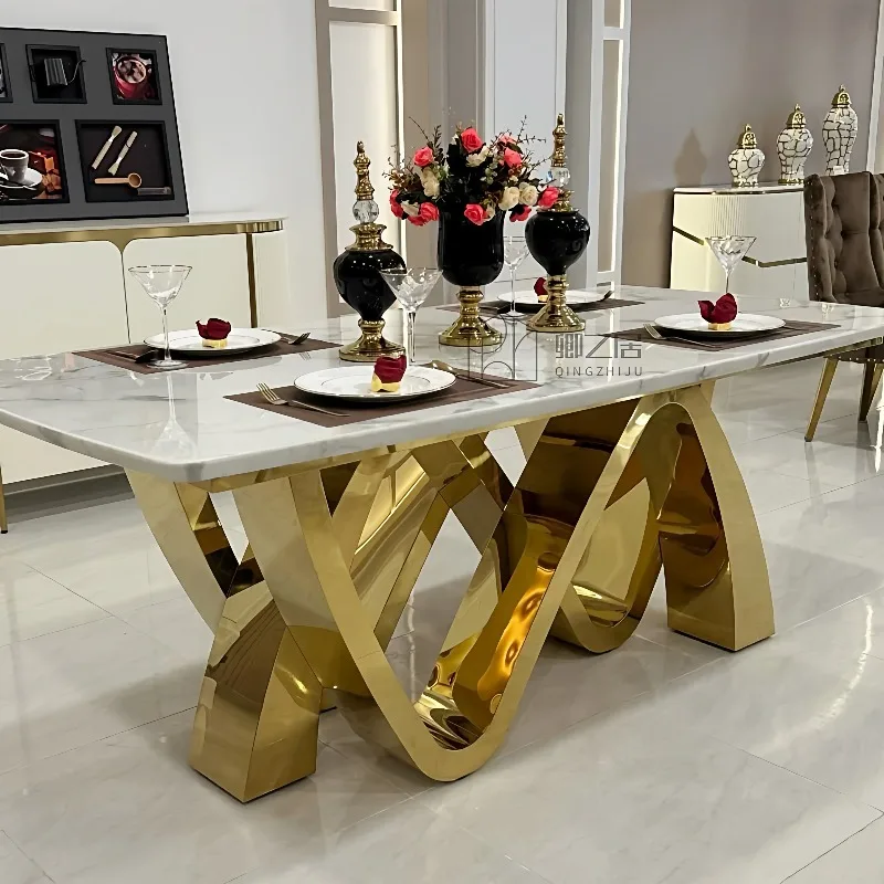 Postmoderner, leichter, luxuriöser Esstisch aus Marmor und Gold im Hongkong-Stil, hochwertiger Esstisch aus Edelstahl für zu Hause, luxuriöser Steintisch und Stühle