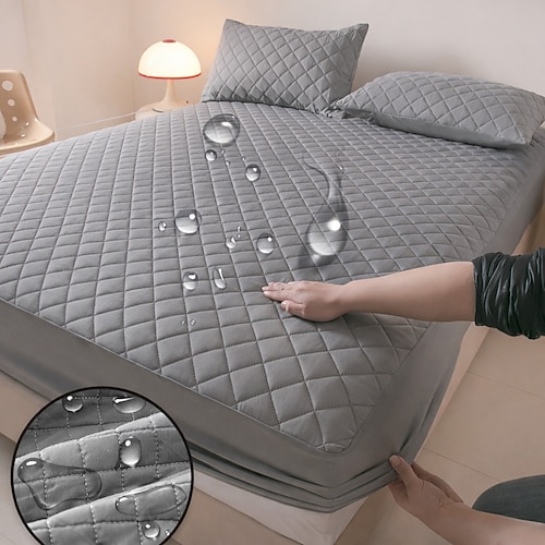 wasserdichter, urinbeständiger Matratzenschoner in Unifarbe mit vollständiger Abdeckung, gesteppt, gebürstet, staubdicht und rutschfest – ideal zum Schutz Ihres Bettes. Image