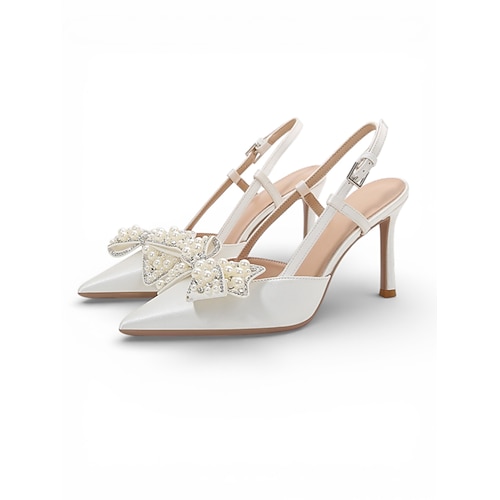 Elfenbeinfarbene Slingback-Hochzeitspumps mit abnehmbarer Perlenschleife – elegante Brautpumps mit spitzer Zehenpartie für Hochzeiten in der Stadt Image