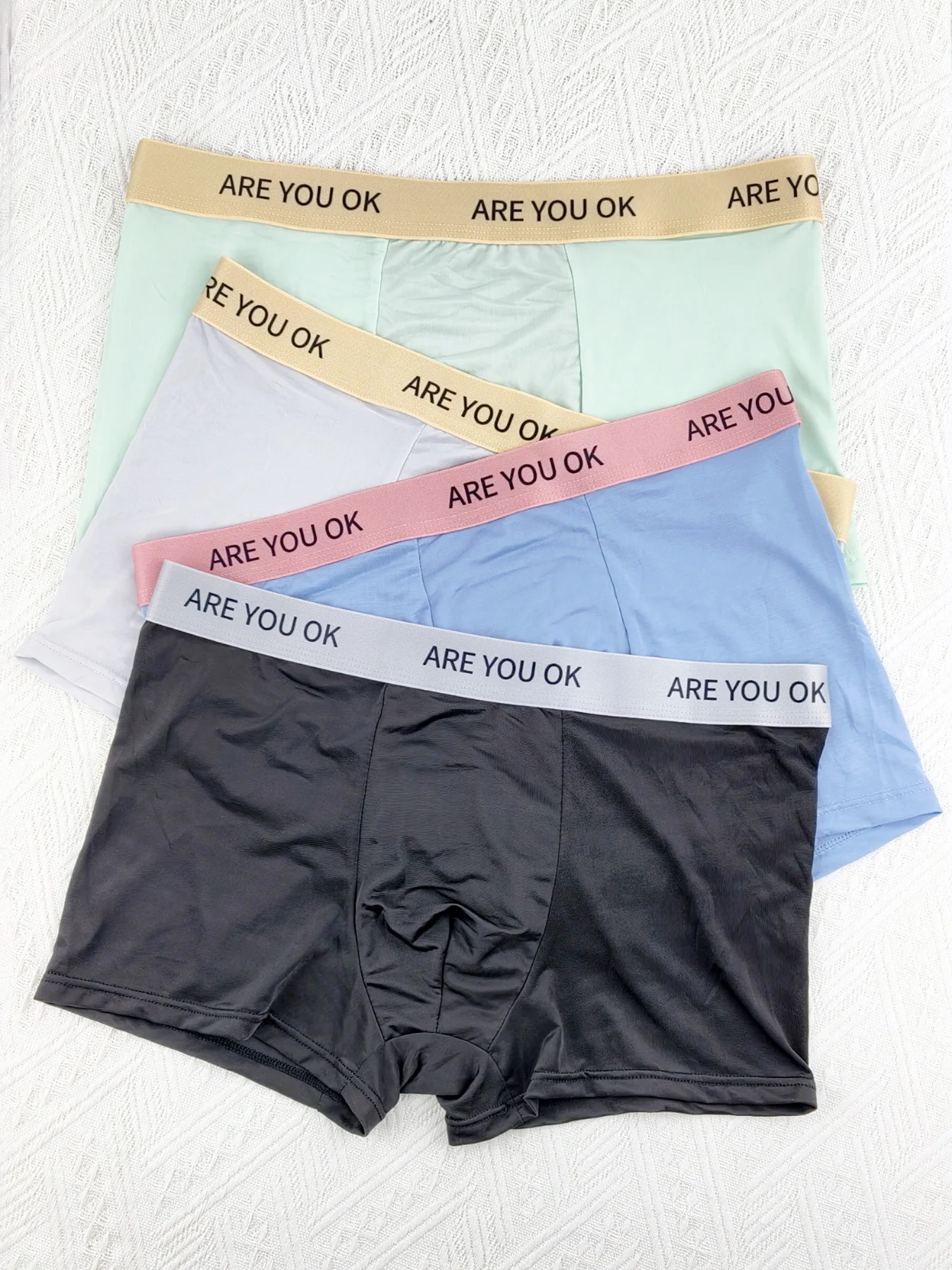 4er-Pack Herren-Boxershorts aus Eisseide – kühlender Stretch-Komfort, trendiger Slogan-Bund, verschiedene Größenoptionen Image