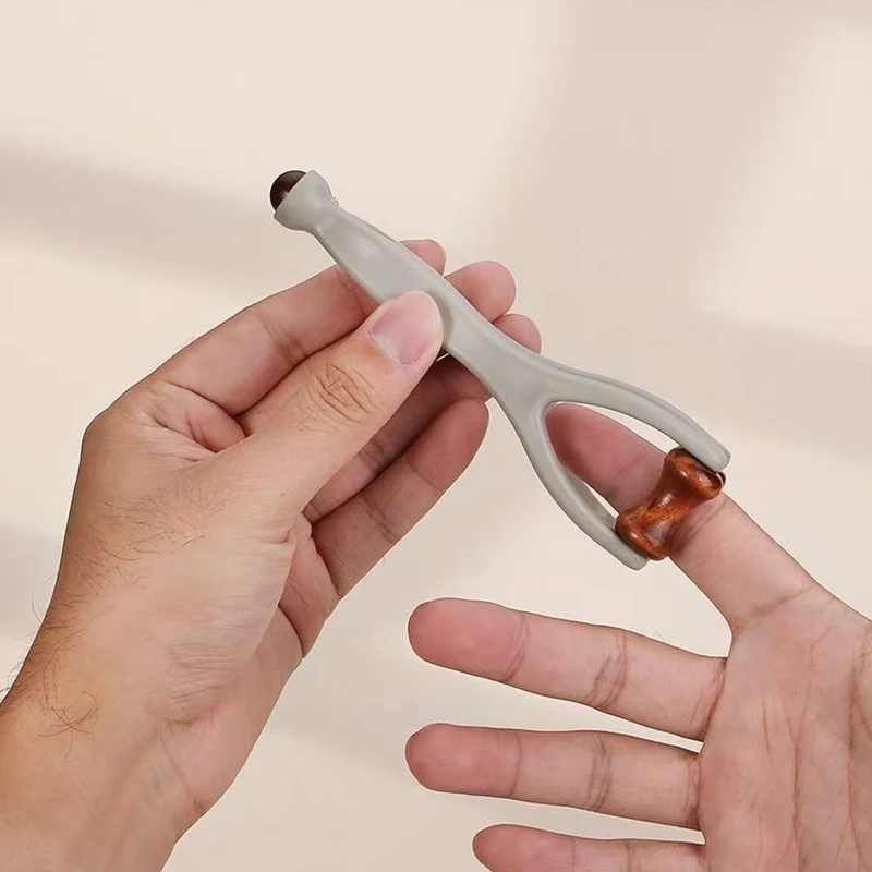 1 Stück Rollen-Fingermassagegerät, Mini-Finger-Gelenkmassagegerät mit elastischem Griff für die Durchblutung der Finger und Muskelentspannung Image
