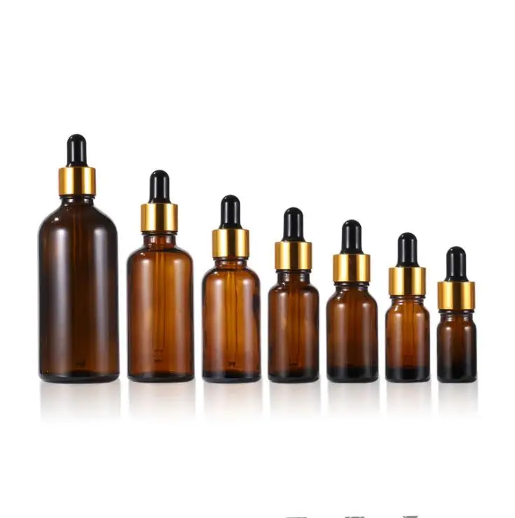 Commercio all'ingrosso 5ml 10ml 15ml 20ml 30ml 50ml 100ml ambra bottiglia di olio essenziale di vetro contagocce bottiglia con oro contagocce