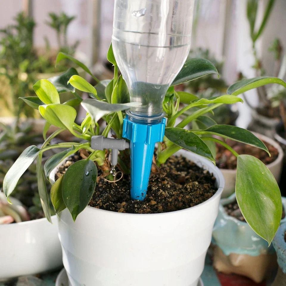 Self Watering Spikes For Plants Automatic Irrigation Drip System With Adjustable Valve For Garden & Potted Plants Self Watering Spikes For Plants Automatic Irrigation Drip System With Adjustable Valve For Garden & Potted Plants