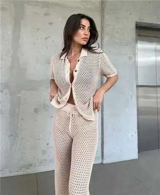 Set di due pezzi lavorato a maglia cava alla moda, cardigan monopetto a maniche corte ampio, cinturino a vita alta, pantaloni a gamba larga, set da donna