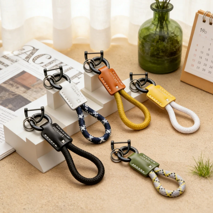 Echtes Rindsleder Schlüsselanhänger Geflochtenes Seil Auto-Schlüsselring Luxuriöser Retro-Taschen-Schlüsselanhänger für Männer und Frauen Image
