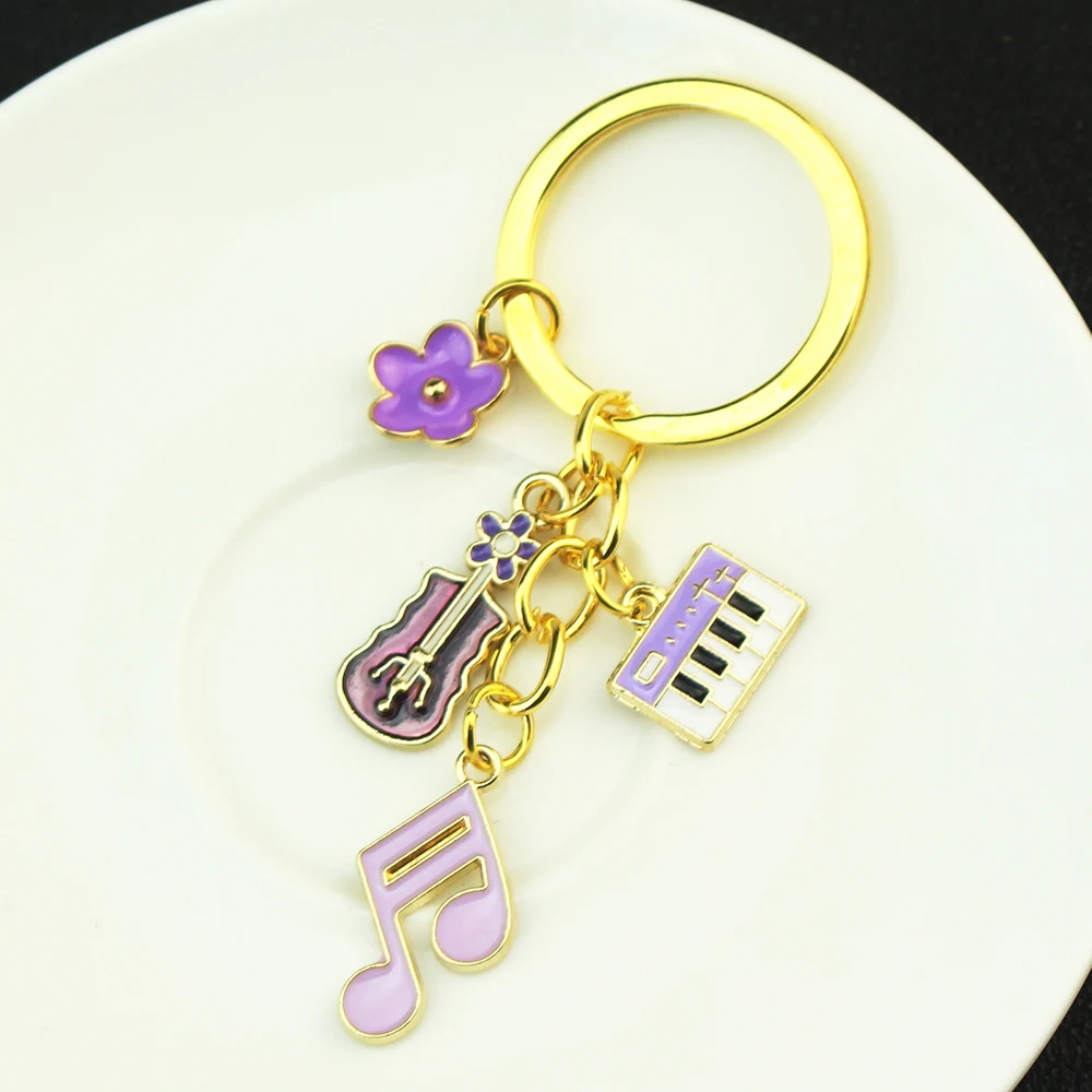 Kreativer Musikalischer Klaviertasten-Schlüsselanhänger aus Legierung mit Gitarren- und Musiknoten-Anhänger für Damen-Handtaschen, Auto-Schlüsselanhänger, Geschenke für Freunde Image
