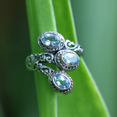 Tranquility Roots,'Silver Cocktail Ring with Three Oval Blue Topaz Gemstones'