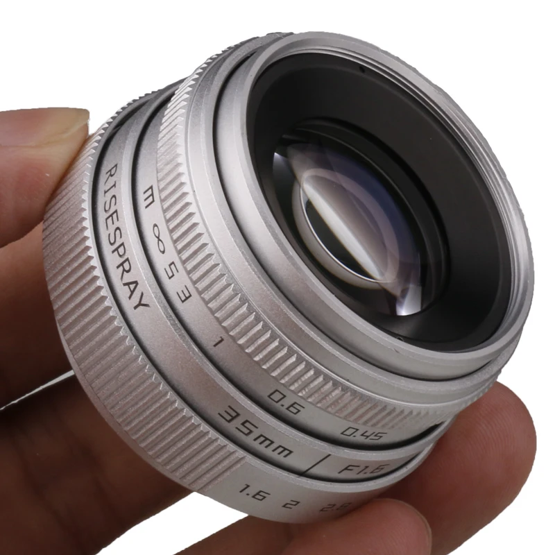 Silbernes Mini 35 mm f/1,6 APS-C CCTV-Objektiv + Adapterring für Panasonic/Olympus Micro 4/3 Sony E A6600 6500 Canon EOS-M M50 Fujifilm Image