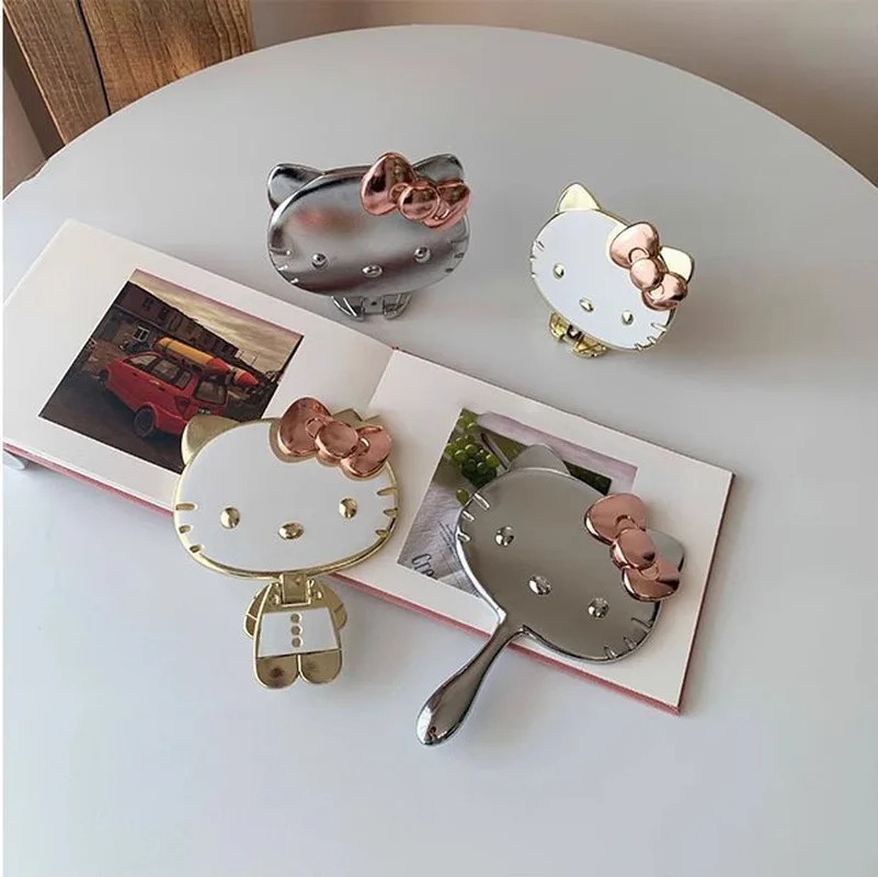 Cartoon Hellokitty Serie Niedlicher Mini Handlicher Klappspiegel Tragbarer Exquisiter Haushalts- und Reise-Kosmetikspiegel Geschenk-Accessoire
