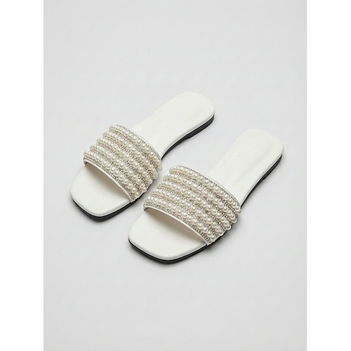 Schwarze, perlenbesetzte Damen-Sandalen – schicke, flache Strandpantoffeln mit Kunstperlenriemen für Inselurlaube und Sommerresorts elegantes Entspannen am Pool Image