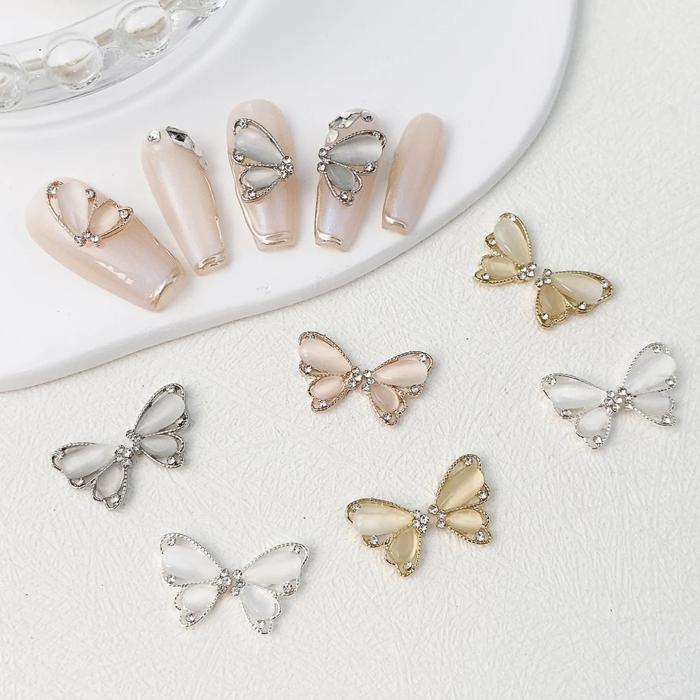 10 stücke Halb Cat Eye Schmetterling Nail art Charme 3D Legierung Glänzend Transparent Schmetterling Nagel Dekoration DIY Luxus Nagel Zubehör Image
