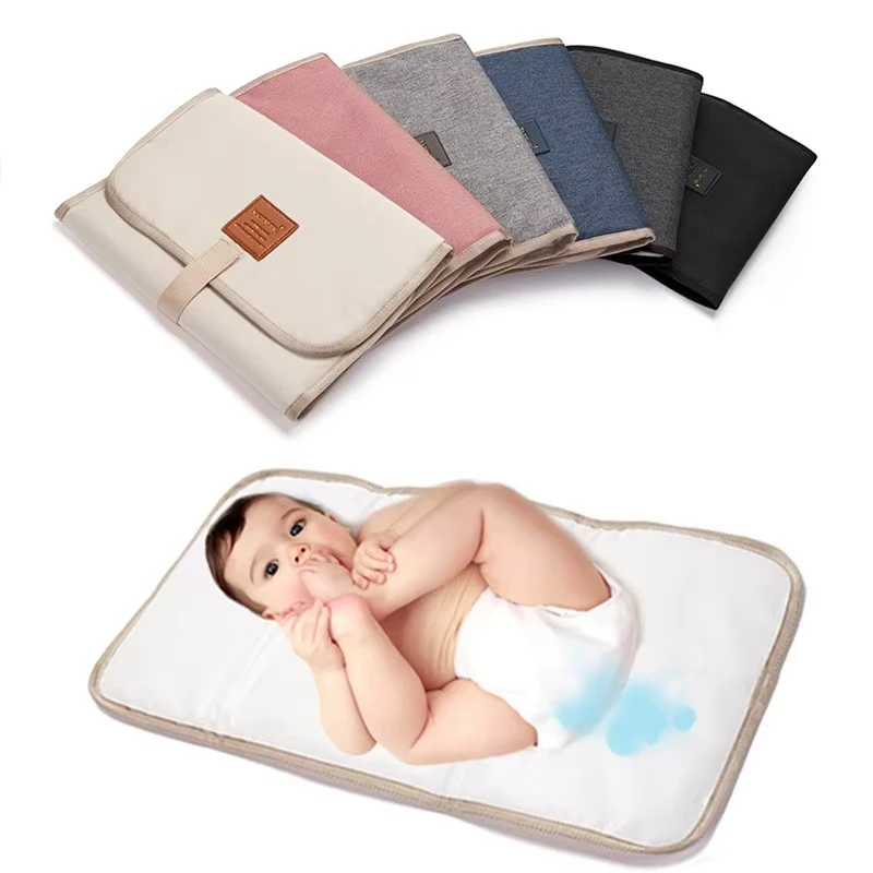 Faltbare Baby-Wickelunterlage Wasserdichte Neugeborenen-Wickelauflage Tragbarer Kleinkind-Wickeltisch Langlebige Oxford-Baby-Wickelunterlage Image