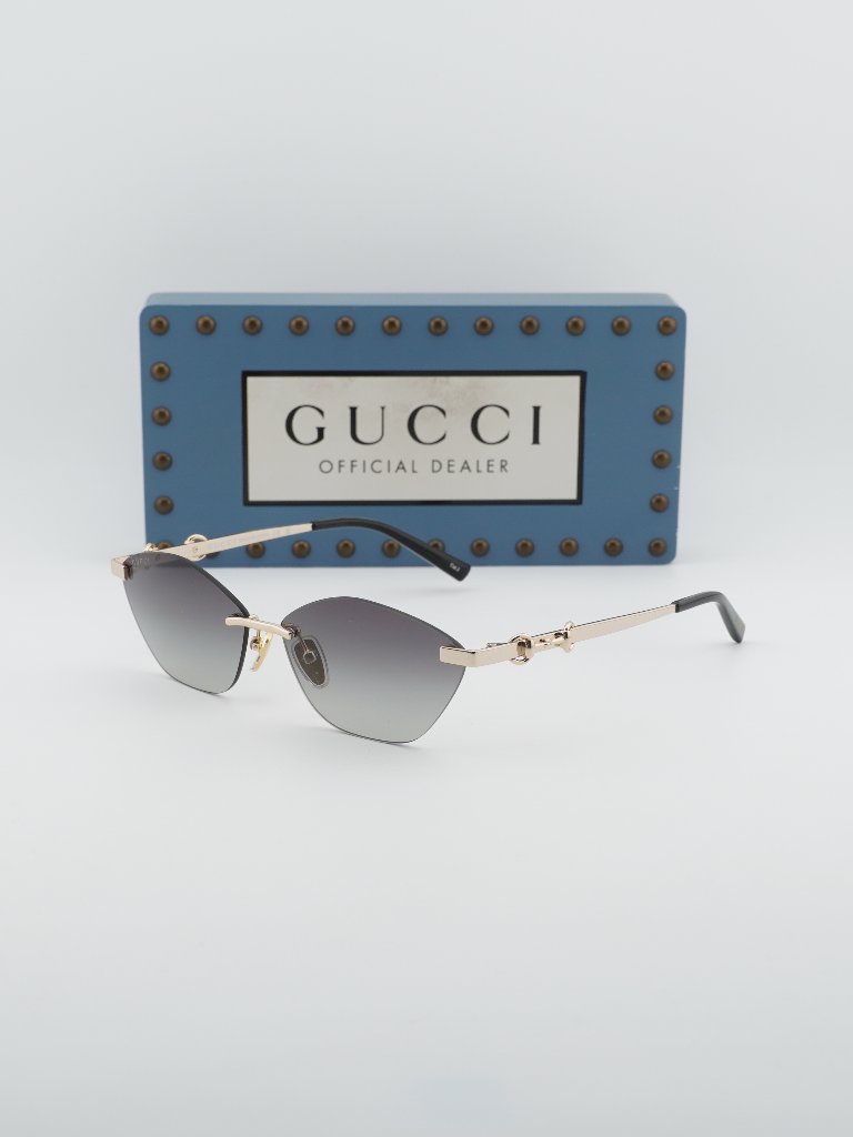 Gucci Accessories | Gucci Gg2050s 002 Rimless Cat Eye Sunglasses - Gold / Grey | Color: Gold/Gray | Size: 59 - 13 - 145