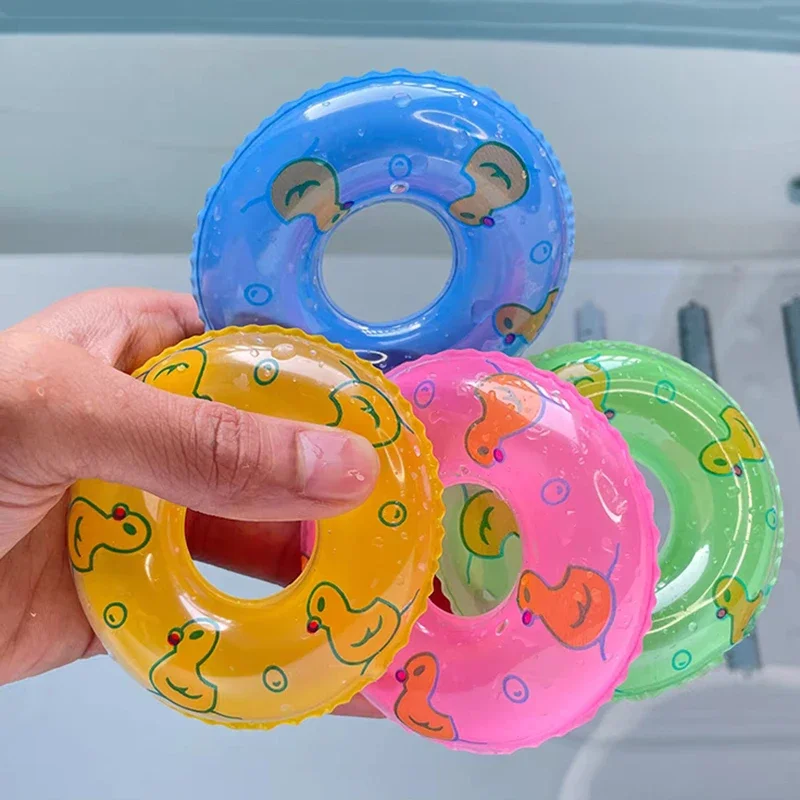 5er-Set Sommer-Mini-Schwimmreifen-Spielzeug für Babys und Kinder – Lustiger Schwimmpuppen-Pool-Schwimmring aus Gummi, aufblasbares Badespielzeug Image