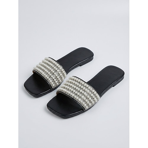 Schwarze, perlenbesetzte Damen-Sandalen – schicke, flache Strandpantoffeln mit Kunstperlenriemen für Inselurlaube und Sommerresorts elegantes Entspannen am Pool Image